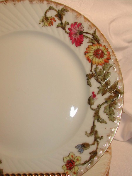 A lovely set of Antique Limoges Wild Flower Plates Jean Pouyat